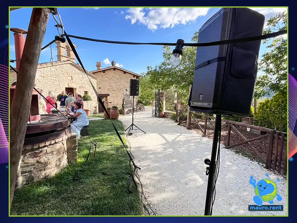 RCF Art 912A active speaker deployed on lawn for wedding welcome aperitif at Borgo Castello Panicaglia