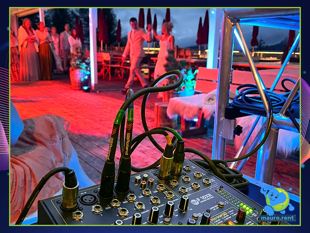 Over-the-shoulder technical perspective of the RCF F 10XR mixing console during Alyssa and Joshua's first dance at Col Pradat lodge.