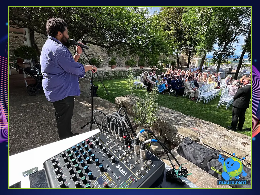 Kemani Anderson Vocal performance with Shure Wireless Microphone at Castello di Rosciano Wedding Ceremony Garden