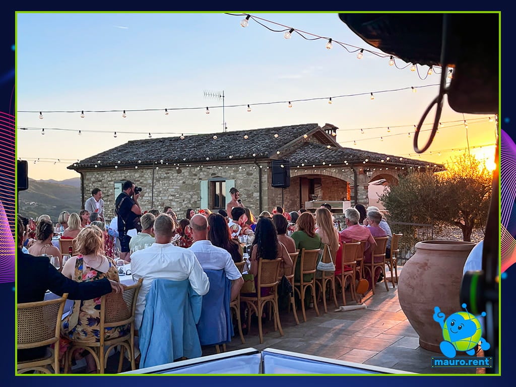 Bride Mollie giving wedding toast with Shure microphone at La Torre di Celle sunset dinner
