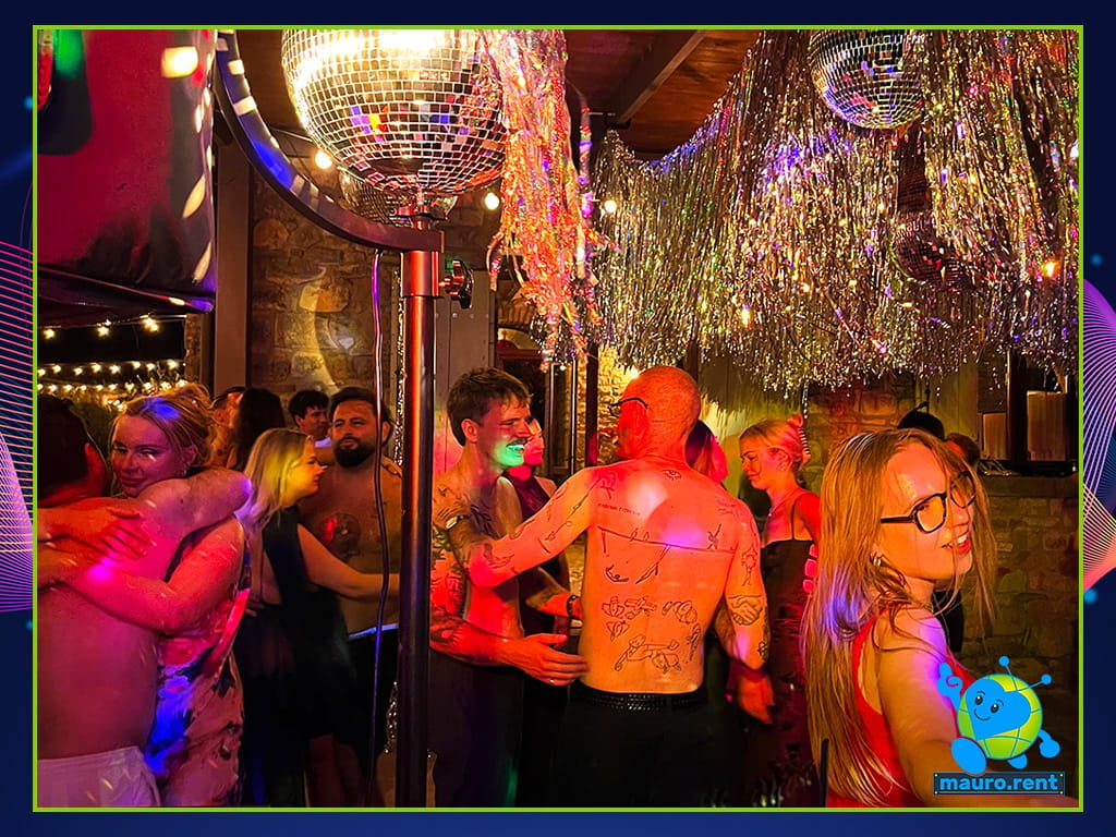 Guests dancing on packed dance floor at La Torre di Celle Mamma mia evening party